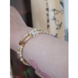 108 karkötő  Sárga Opál ásványkarkötő 