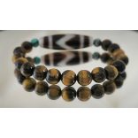 DZI Tigrisfog & Tigrisszem unisex karkötő – a valódi erő, siker és védelem szimbóluma